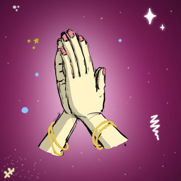 hands of a woman folded in prayer